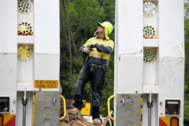 Council worker on truck at construction site