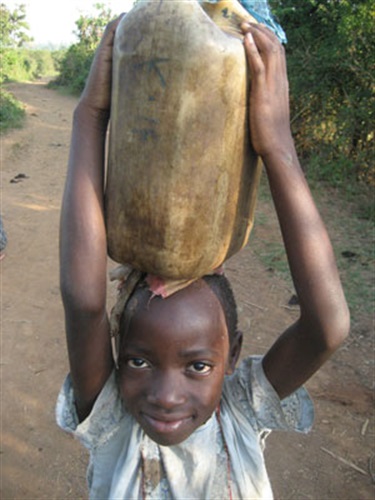 Child carrying water