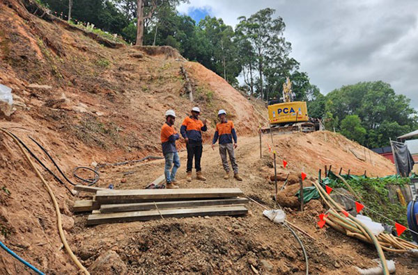 Church Street - Contractors inspect embankment stabilisation