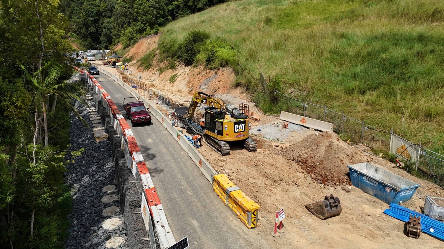 Soil anchors are being drilled through concrete piles.jpg