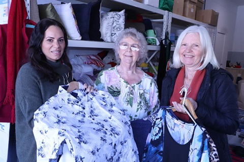 Chinderah Community Hub' Kay Redman, Sandy Gilbert and Lyn Hart inspect some of the items of clothing which are available the Hub's Community Closet.