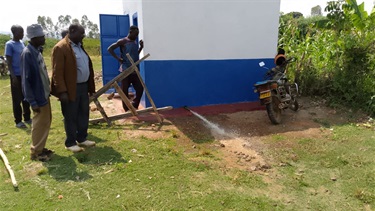 Inspecting the water pressure.