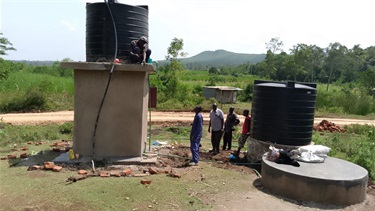 Connecting to the water storage tanks.