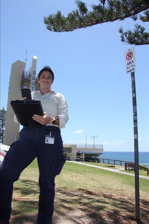 Ranger patrolling new parking restrictions at Point Danger