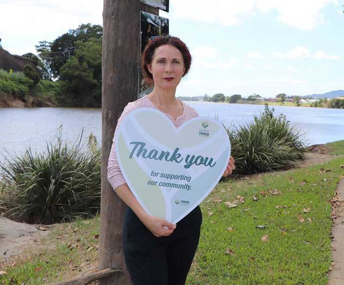 Mayor Cr Chris Cherry holding 'thank you' love heart - 2022 Mayoral Flood Appeal