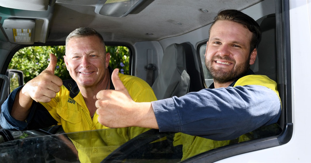 Outdoor staff with thumbs up